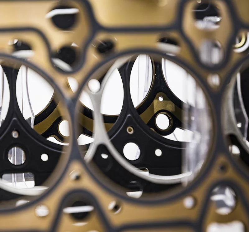 Close-up of overlapping precision-cut metal components
