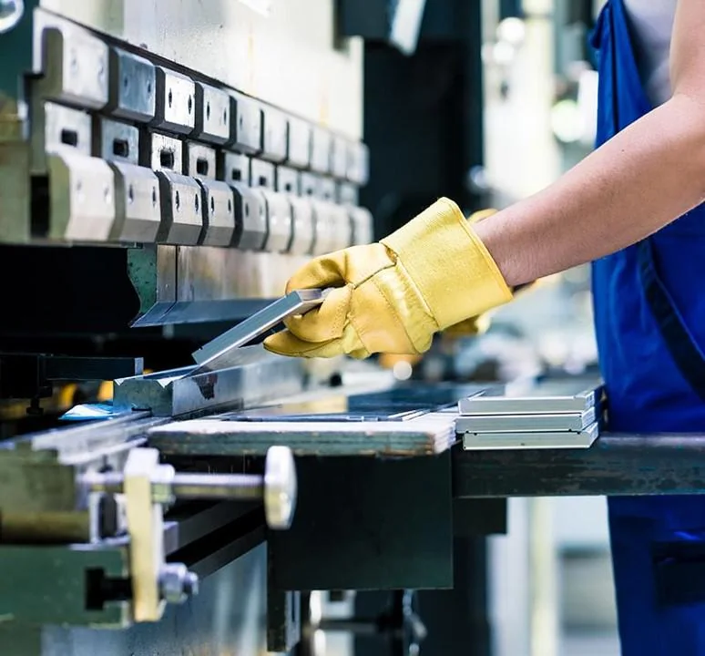 A Presso operator forming a sheet-metal component in a press brake